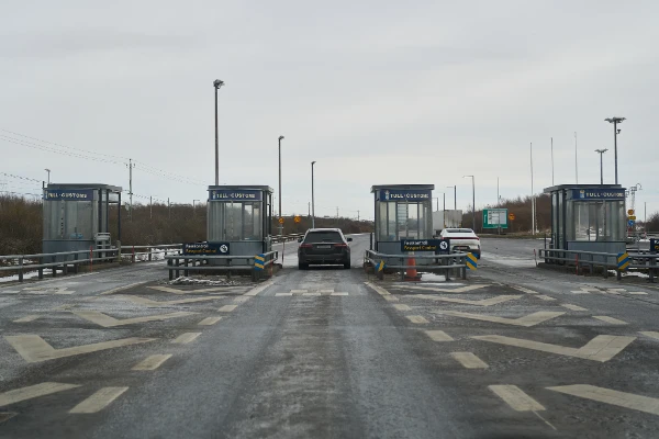 Swedish Tull/Customs and Passkontroll/Passport Control booths at the Øresund Bridge border crossing on the Swedish side, captured on February 6, 2026